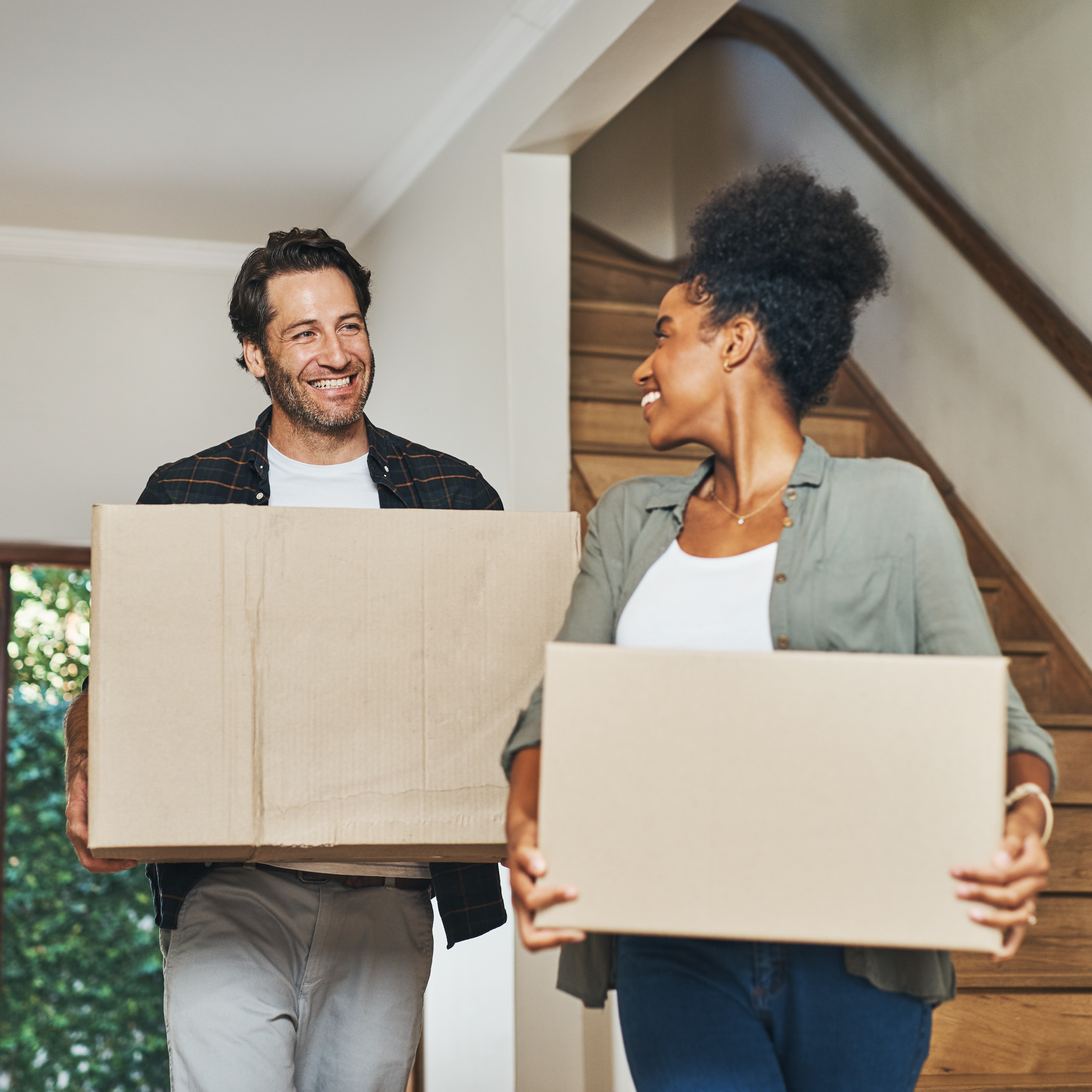 A couple with moving boxes